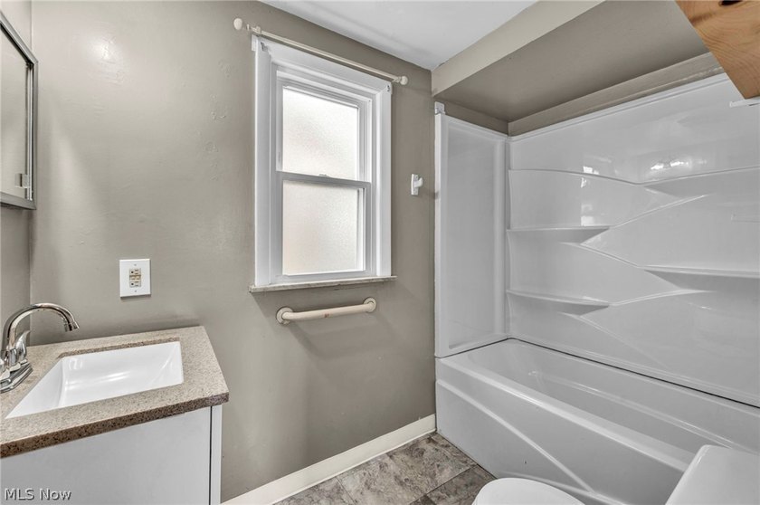 Welcome to 180 E. 264th Street, a beautifully updated 3-bedroom - photo 19