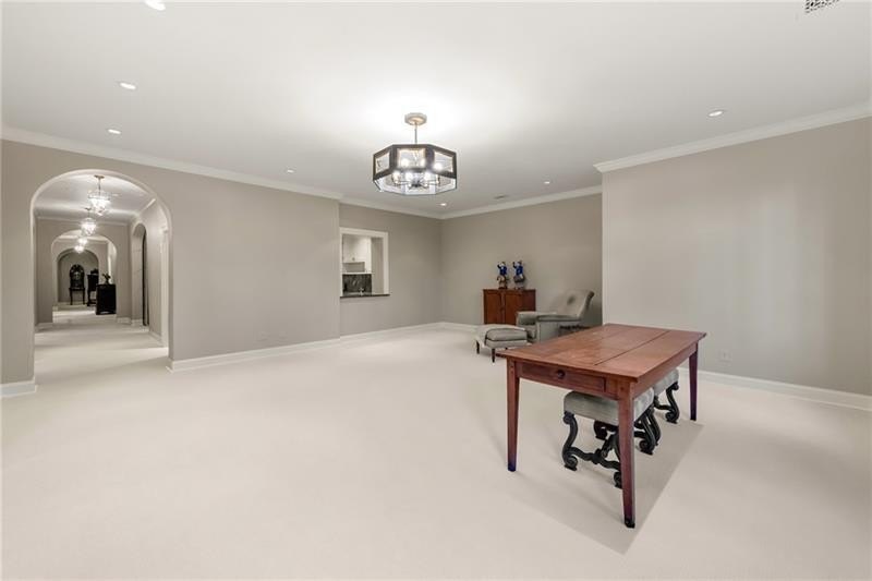 This home is truly magnificent! With its soaring ceilings and - photo 45