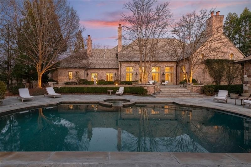 This home is truly magnificent! With its soaring ceilings and - photo 48