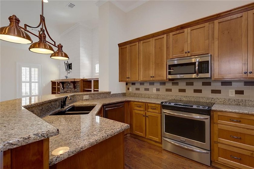Welcome to 3315 Double Eagle Lane, where low-maintenance living - photo 10