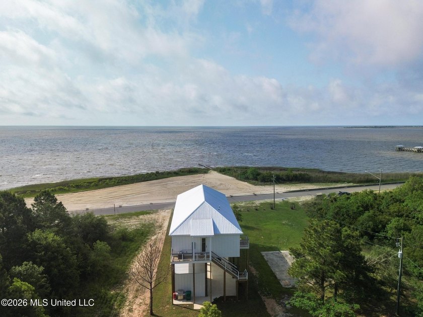 Experience effortless beachfront living in this stunning turnkey - photo 40