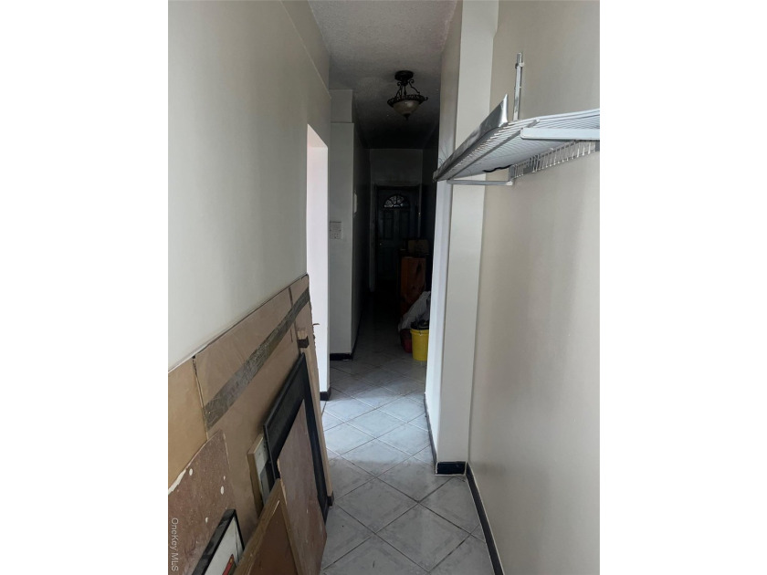 Welcome to this solid brick 4-family attached home located in - photo 11
