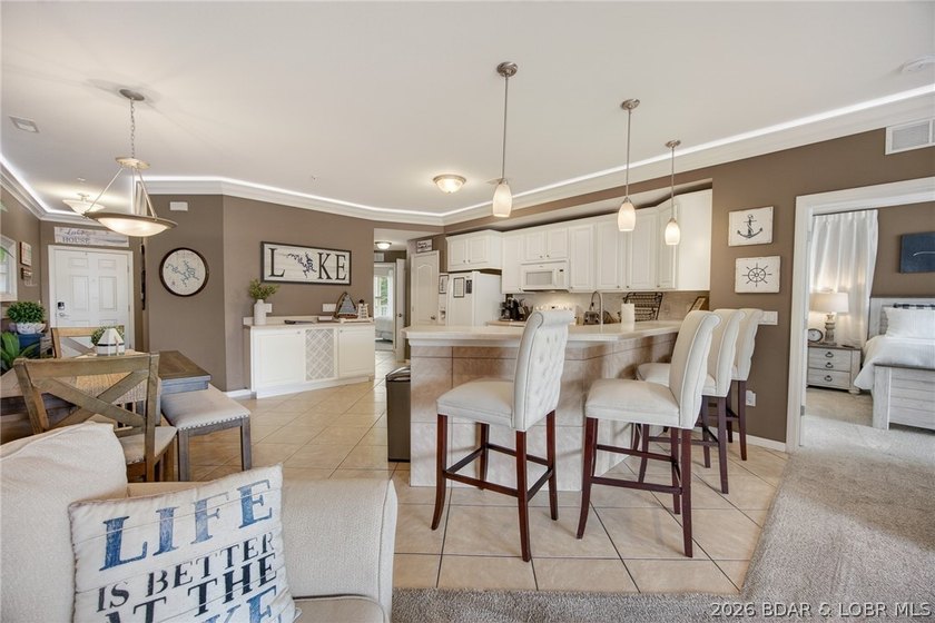 Welcome to Land's End Condominiums, one of the most sought-after - photo 13