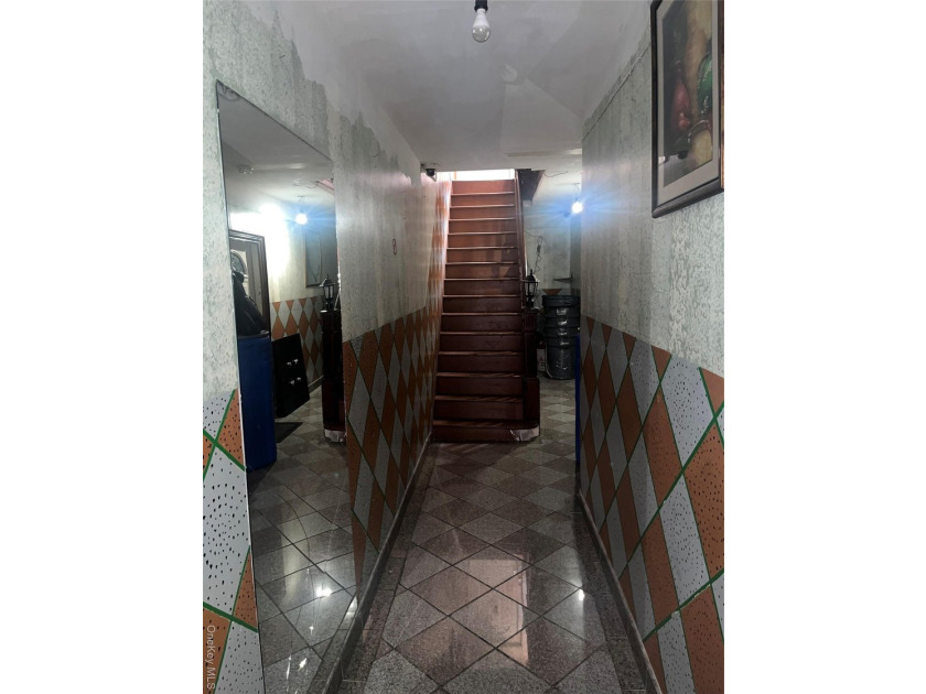 Welcome to this solid brick 4-family attached home located in - photo 14