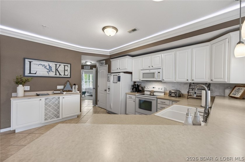 Welcome to Land's End Condominiums, one of the most sought-after - photo 22