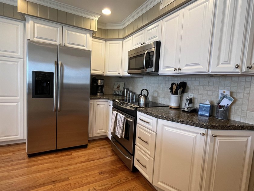 Discover the epitome of coastal elegance at 103 Inlet Point - photo 23