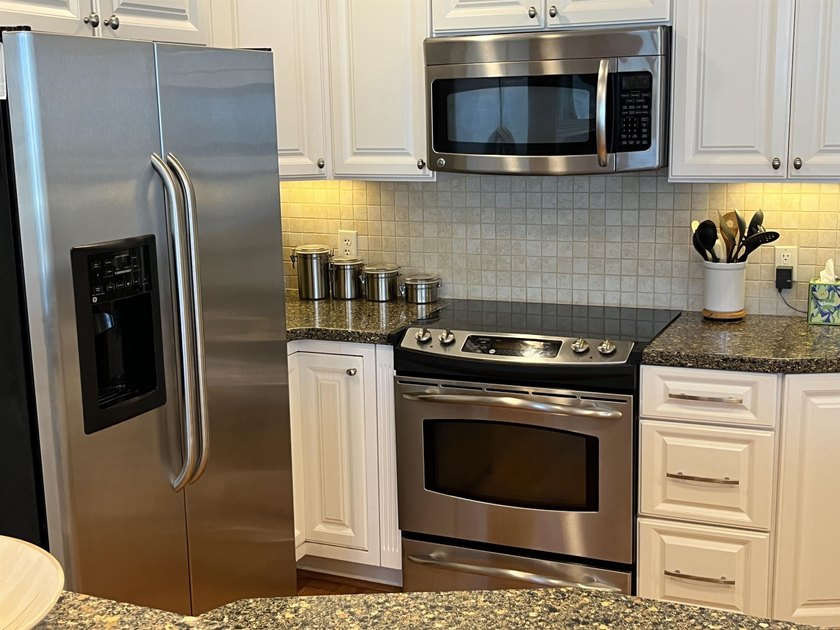 Discover the epitome of coastal elegance at 103 Inlet Point - photo 25