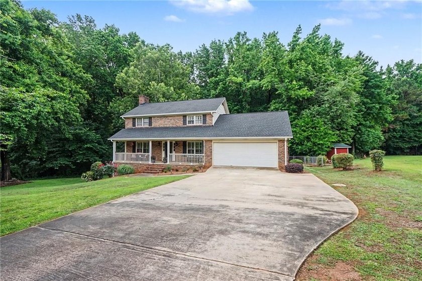 Welcome to this charming traditional home nestled on a spacious - photo 2