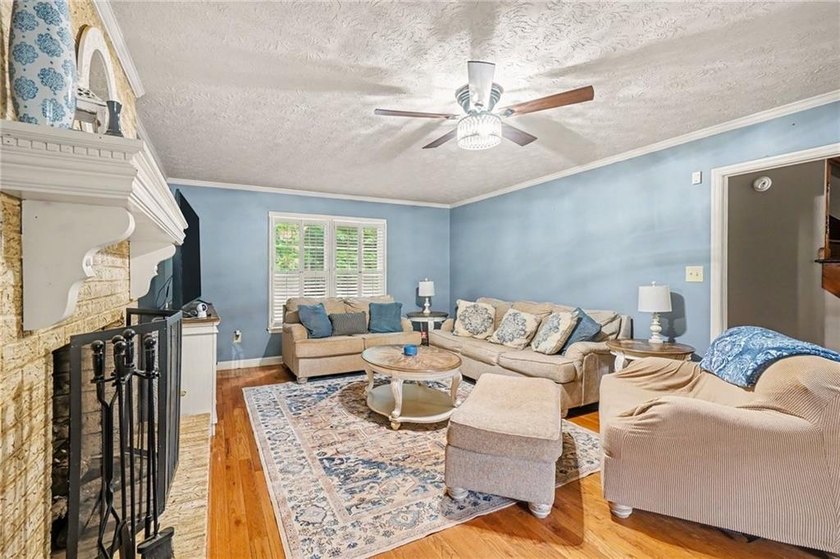Welcome to this charming traditional home nestled on a spacious - photo 3