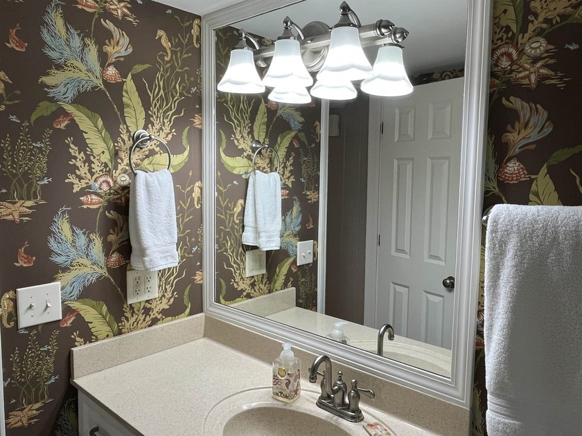 Discover the epitome of coastal elegance at 103 Inlet Point - photo 34