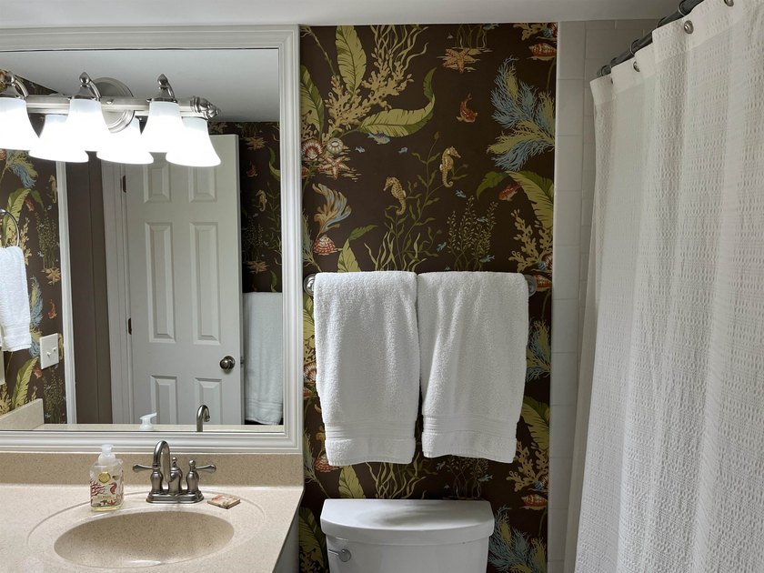 Discover the epitome of coastal elegance at 103 Inlet Point - photo 35