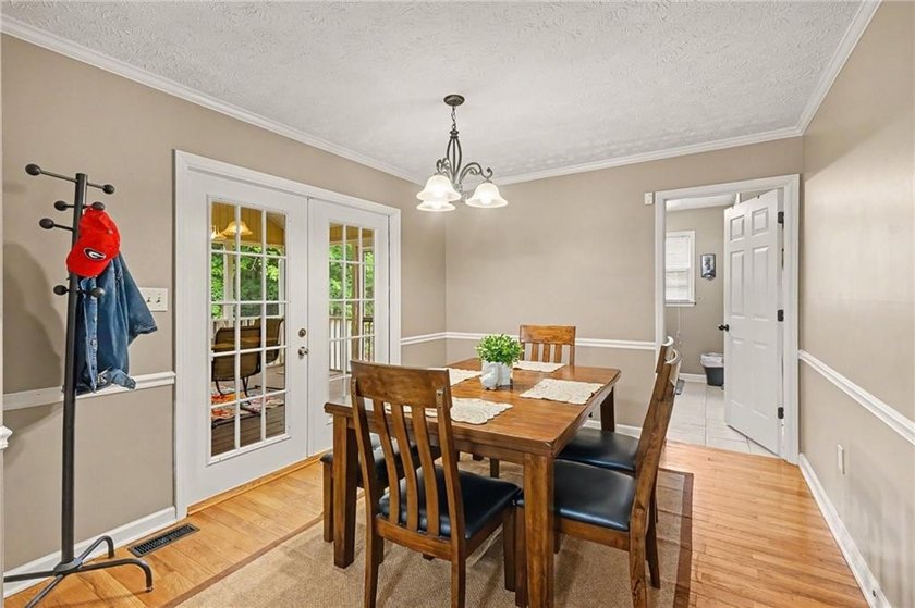 Welcome to this charming traditional home nestled on a spacious - photo 8