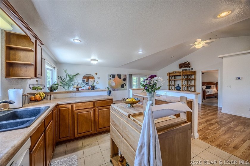 Welcome to this 4-bedroom, 3-bath lake-area-retreat with - photo 12