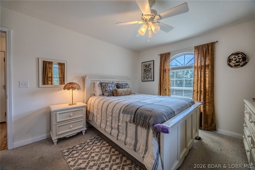Welcome to this 4-bedroom, 3-bath lake-area-retreat with - photo 20