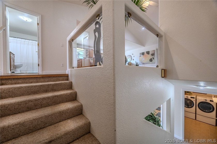 Welcome to this 4-bedroom, 3-bath lake-area-retreat with - photo 25