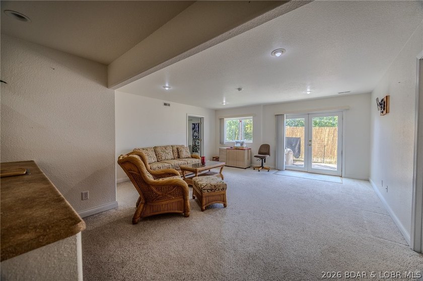 Welcome to this 4-bedroom, 3-bath lake-area-retreat with - photo 27
