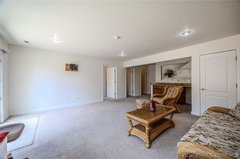 Welcome to this 4-bedroom, 3-bath lake-area-retreat with - photo 29