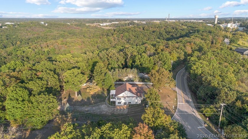 Welcome to this 4-bedroom, 3-bath lake-area-retreat with - photo 41