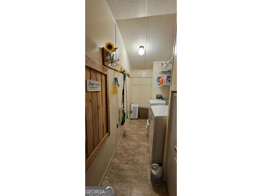 Tucked away at 567 Dale Trail in Menlo, GA, this isn't just a - photo 14