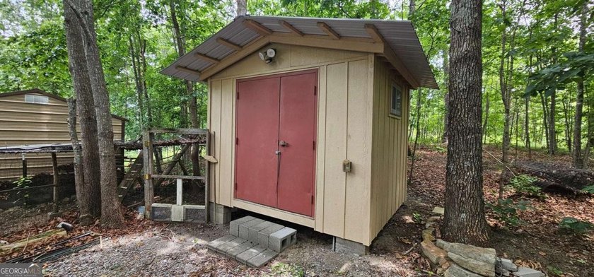 Tucked away at 567 Dale Trail in Menlo, GA, this isn't just a - photo 30