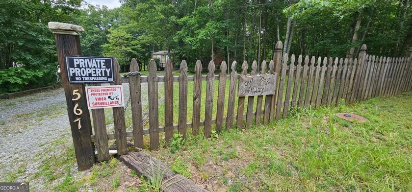 Tucked away at 567 Dale Trail in Menlo, GA, this isn't just a - photo 31