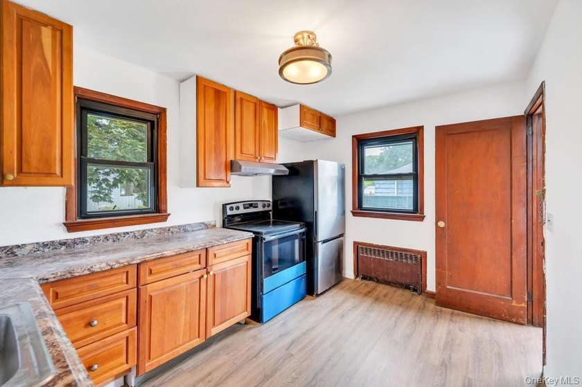 Welcome to this charming Cape Cod home located in the heart of - photo 13