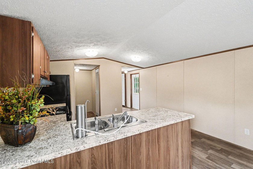Brand New Home and Utilities built on over Half an Acre in a - photo 10