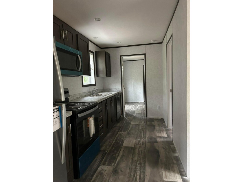 NEWLY PRICED and ready to move! Introducing an affordable new - photo 11