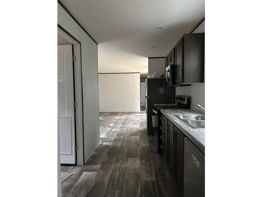 NEWLY PRICED and ready to move! Introducing an affordable new - photo 12
