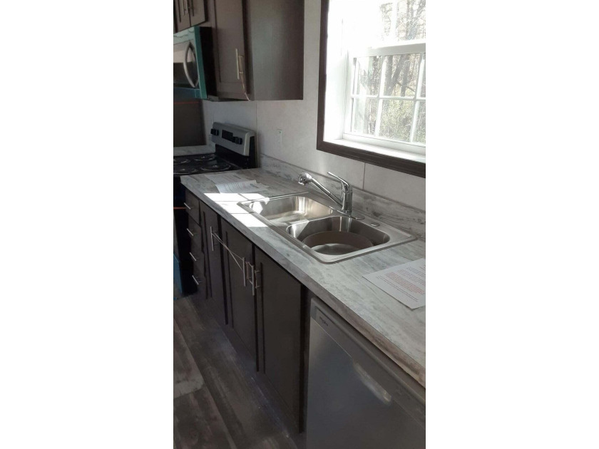 NEWLY PRICED and ready to move! Introducing an affordable new - photo 13