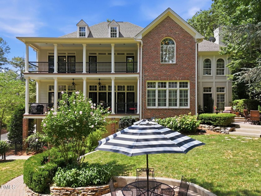 Quietly tucked away in North Ridge, this custom estate captures - photo 7