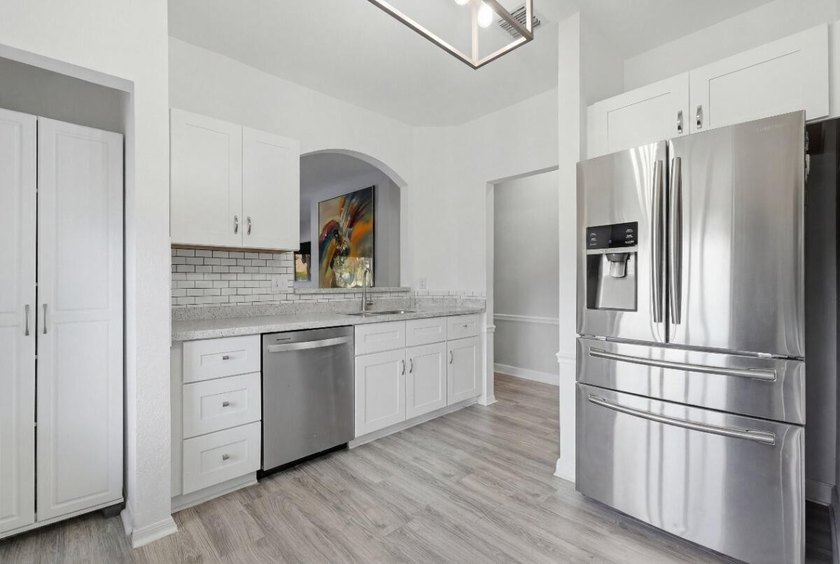 Beautifully updated 3-bedroom, 2-bath corner villa with 1,495 sq - photo 13