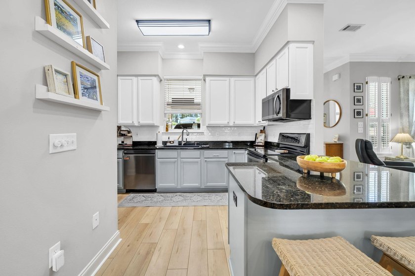 Welcome to 65 Courtyard Circle, where coastal living meets - photo 14