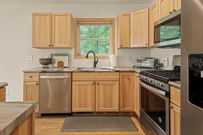 Experience waterfront living on Long Lake, part of the renowned - photo 27