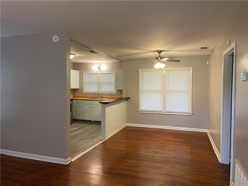 Charming and centrally located, 4426 Wesley Dr offers a - photo 2