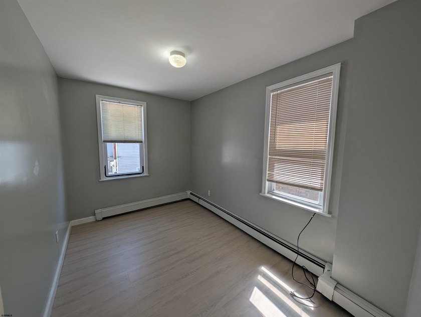 Newly Renovated Single Family Row Home. Two Story, Three - photo 14