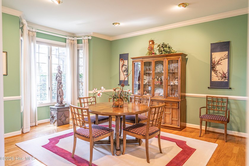 Located in the Pinehurst No. 6 neighborhood, this custom-built - photo 3