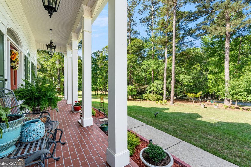 This stunning 4 bedroom, 4 bath home is packed is located in - photo 3
