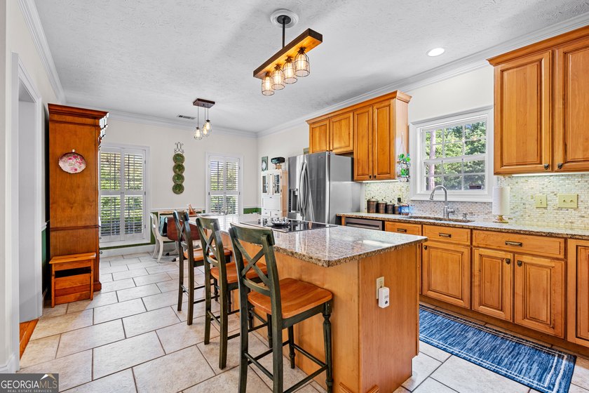 This stunning 4 bedroom, 4 bath home is packed is located in - photo 10