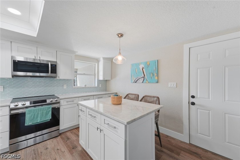 Welcome to 5400 Almar Drive, a rare waterfront gem situated on a - photo 11