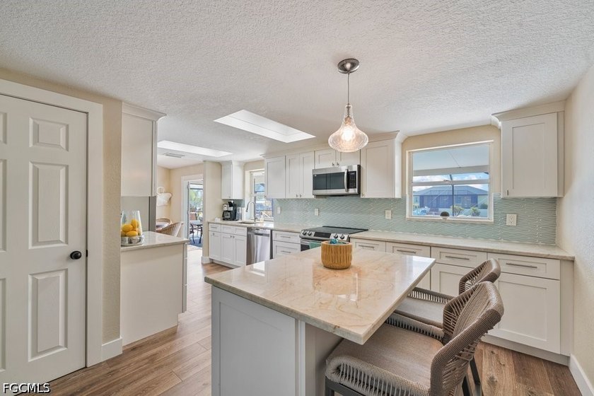 Welcome to 5400 Almar Drive, a rare waterfront gem situated on a - photo 12