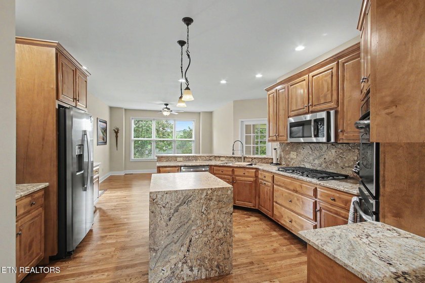 This seasonal lakeview home is located at 205 Oonoga Way, in - photo 15