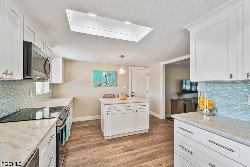 Welcome to 5400 Almar Drive, a rare waterfront gem situated on a - photo 16