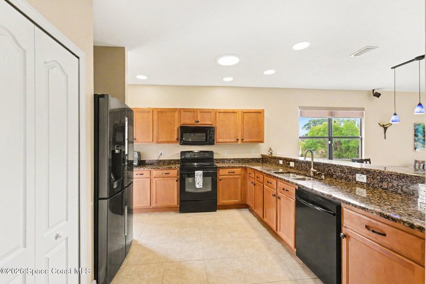 Stunning 3 bed 2 bath home with bonus room awaits its new owners - photo 8