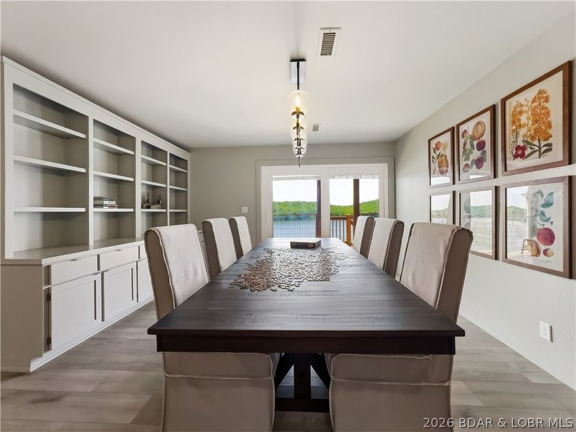 Turnkey luxury and breathtaking lakefront views await in this - photo 18