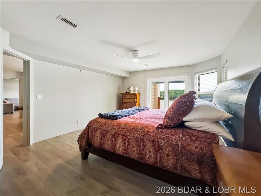 Turnkey luxury and breathtaking lakefront views await in this - photo 20