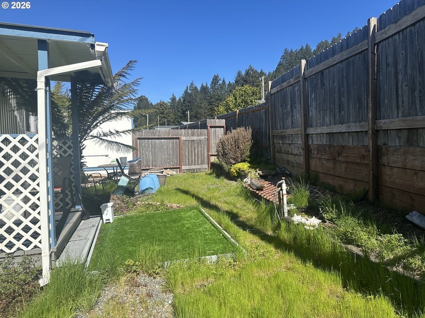 This home nestled in a 55+ park in the Harbor Hills is perfect - photo 22