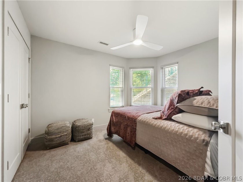 Turnkey luxury and breathtaking lakefront views await in this - photo 23