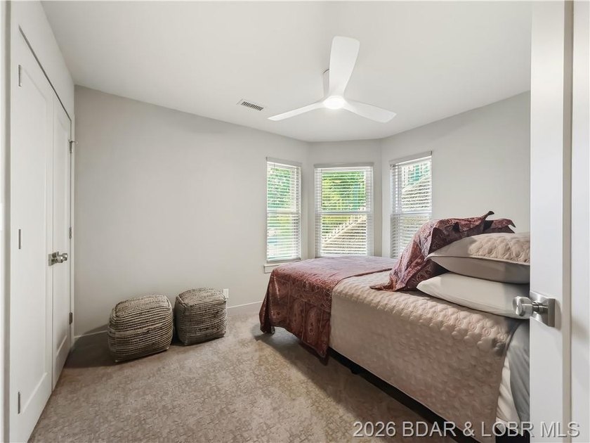 Turnkey luxury and breathtaking lakefront views await in this - photo 23