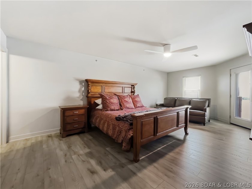 Turnkey luxury and breathtaking lakefront views await in this - photo 27